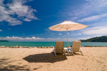 Two chairs on a beach. Two chairs on a beach.