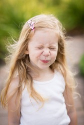 A little girl in an undershirt. A little girl in an undershirt.