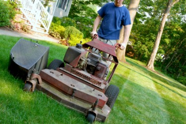 A man doing yardwork. A man doing yardwork.