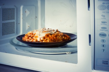 This food is about to be zapped in this microwave oven. This food is about to be zapped in this microwave oven.
