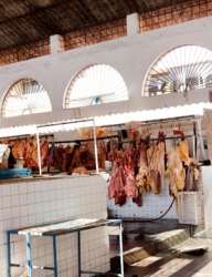 Freshly butchered meat in an abattoir. Freshly butchered meat in an abattoir.