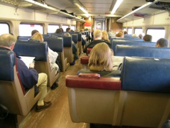 People aboard a train. People aboard a train.