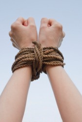 Bound hands. Bound hands.