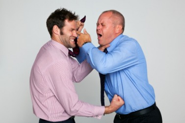 Two men having a brawl. Two men having a brawl.