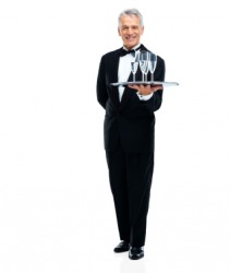A butler serves champagne. A butler serves champagne.