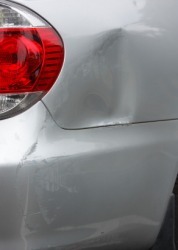 This car has a dent. This car has a dent.