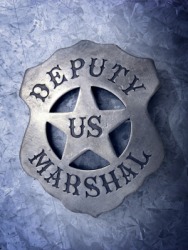 The badge of a U.S. deputy marshal. The badge of a U.S. deputy marshal.