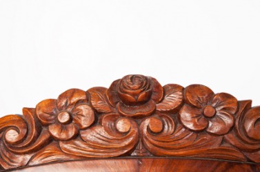 Detailed carving on a piece of furniture. Detailed carving on a piece of furniture.