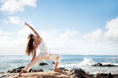 A dexterous woman practices yoga. A dexterous woman practices yoga.