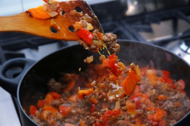 Cooking sauce in order to make lasagne. Cooking sauce in order to make lasagne.