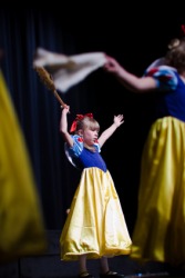 A child acting in a play. A child acting in a play.