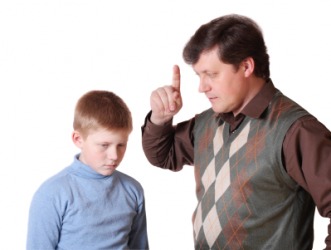 A father admonishes his child. A father admonishes his child.
