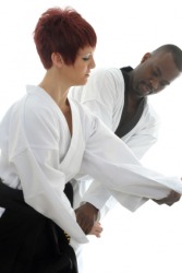 A couple practicing Akido. A couple practicing Akido.