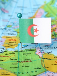 A global map showing Algeria, its location and flag. A global map showing Algeria, its location and flag.