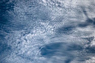 Altocumulus clouds. Altocumulus clouds.