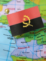 A global map of Angola and its flag. A global map of Angola and its flag.
