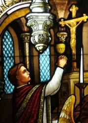 Stained glass depicting St. Thomas Aquinas. Stained glass depicting St. Thomas Aquinas.