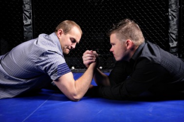 Two men arm-wrestling, or Indian wrestling. Two men arm-wrestling, or Indian wrestling.