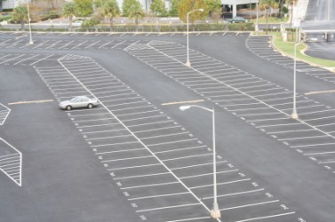 An asphalt parking lot. An asphalt parking lot.