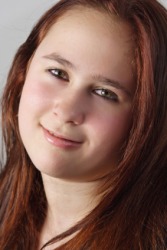 A girl with auburn hair. A girl with auburn hair.
