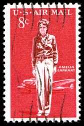 A stamp depicting Aviatrix Amelia Earhart. A stamp depicting Aviatrix Amelia Earhart.