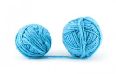 Yarn wound into two balls. Yarn wound into two balls.