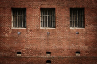 Barred prison windows. Barred prison windows.