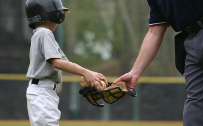 A batboy at work. A batboy at work.