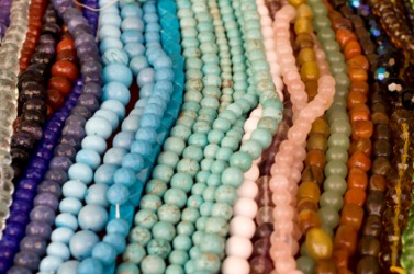 Several strands of colored beads. Several strands of colored beads.