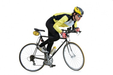 A man riding a bicycle. A man riding a bicycle.