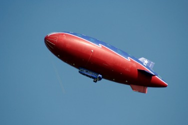 A red and blue blimp. A red and blue blimp.