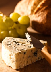 A wedge of bleu cheese. A wedge of bleu cheese.