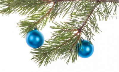 Two blue ornaments on a tree. Two blue ornaments on a tree.