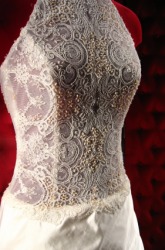 A white dress with a lace bodice. A white dress with a lace bodice.