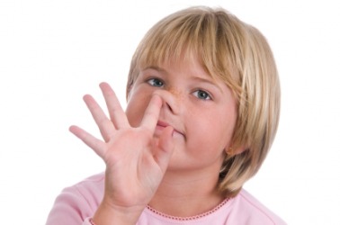This kid is going after her boogers. This kid is going after her boogers.