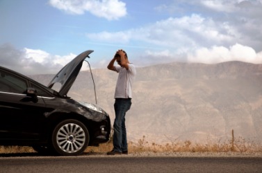 This mans car has had a breakdown. This mans car has had a breakdown.