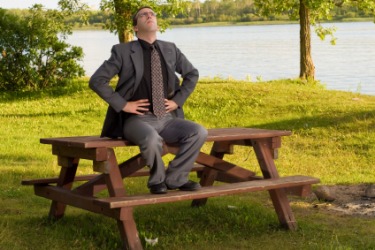 A man takes in a breath of fresh air. A man takes in a breath of fresh air.