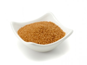 A bowl of brown sugar. A bowl of brown sugar.