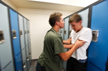 A young man being a bully. A young man being a bully.