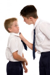 One boy bullying another. One boy bullying another.