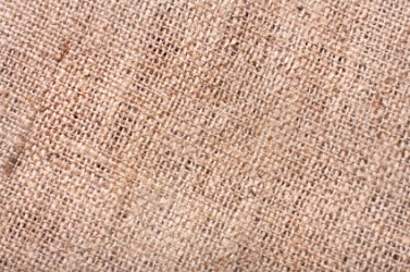 A close up of a piece of burlap cloth. A close up of a piece of burlap cloth.