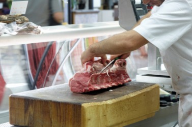 A butcher at work. A butcher at work.