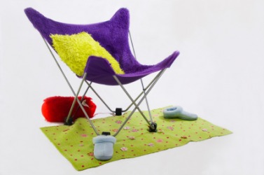 A bright purple butterfly chair. A bright purple butterfly chair.