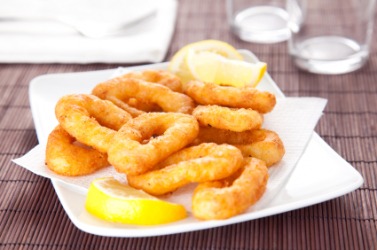 A dish of fried calamari rings. A dish of fried calamari rings.