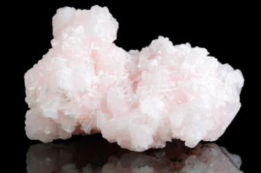 Calcite or calcspar mineral crystal. Calcite or calcspar mineral crystal.