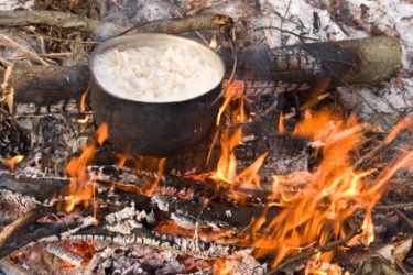 A caldron on a campfire. A caldron on a campfire.