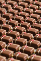 Rows of chocolate candies. Rows of chocolate candies.