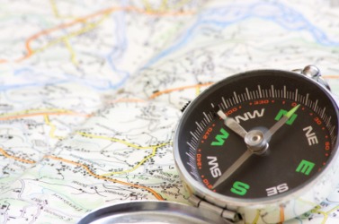 A compass showing its cardinal points. A compass showing its cardinal points.