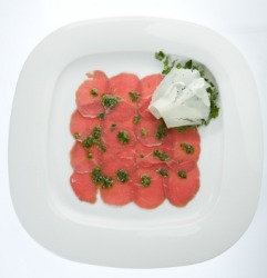 A dish of carpaccio. A dish of carpaccio.