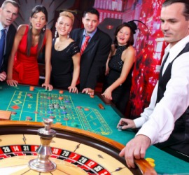 People in a gambling casino. People in a gambling casino.
